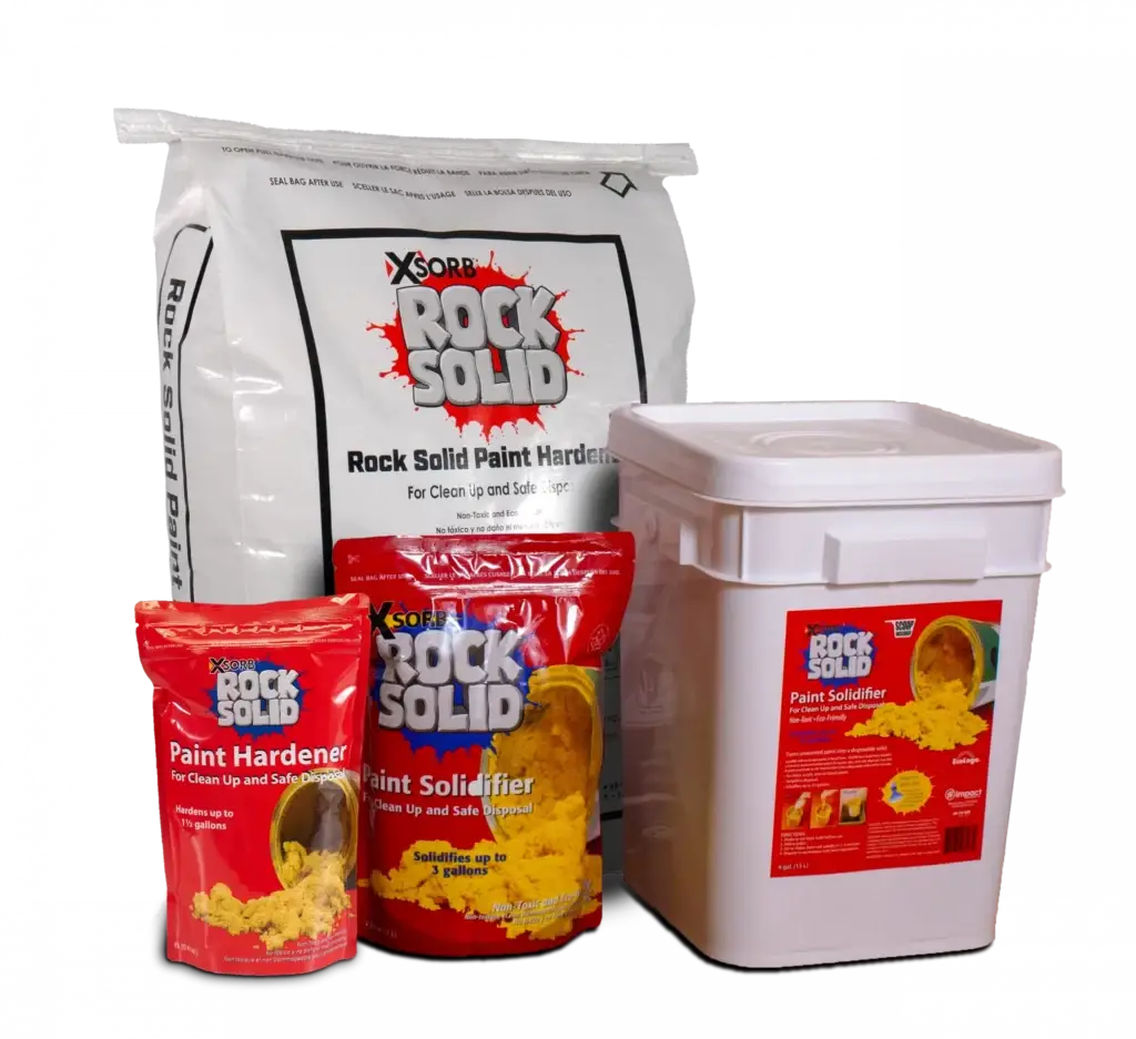 X-Sorb Rock Solid paint solidifier products displayed in bags, pouches, and a container for solidifying paint waste for safe cleanup and disposal.