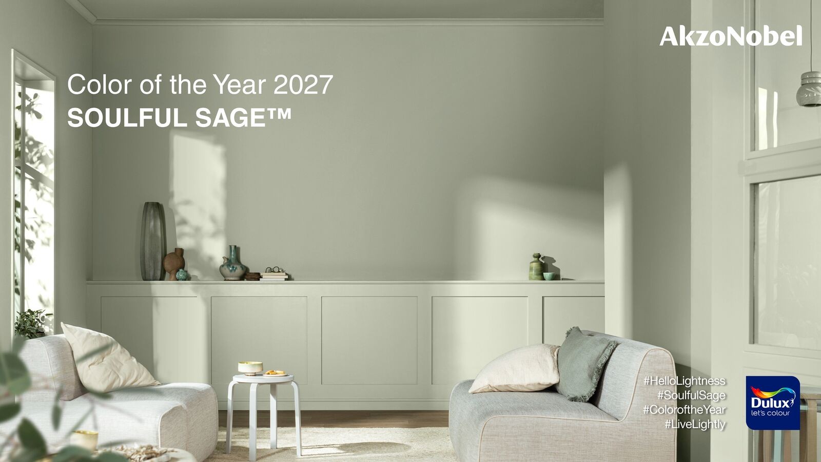 AkzoNobel Color of the Year 2027, Soulful Sage, featured in a calm and light-filled modern living room.